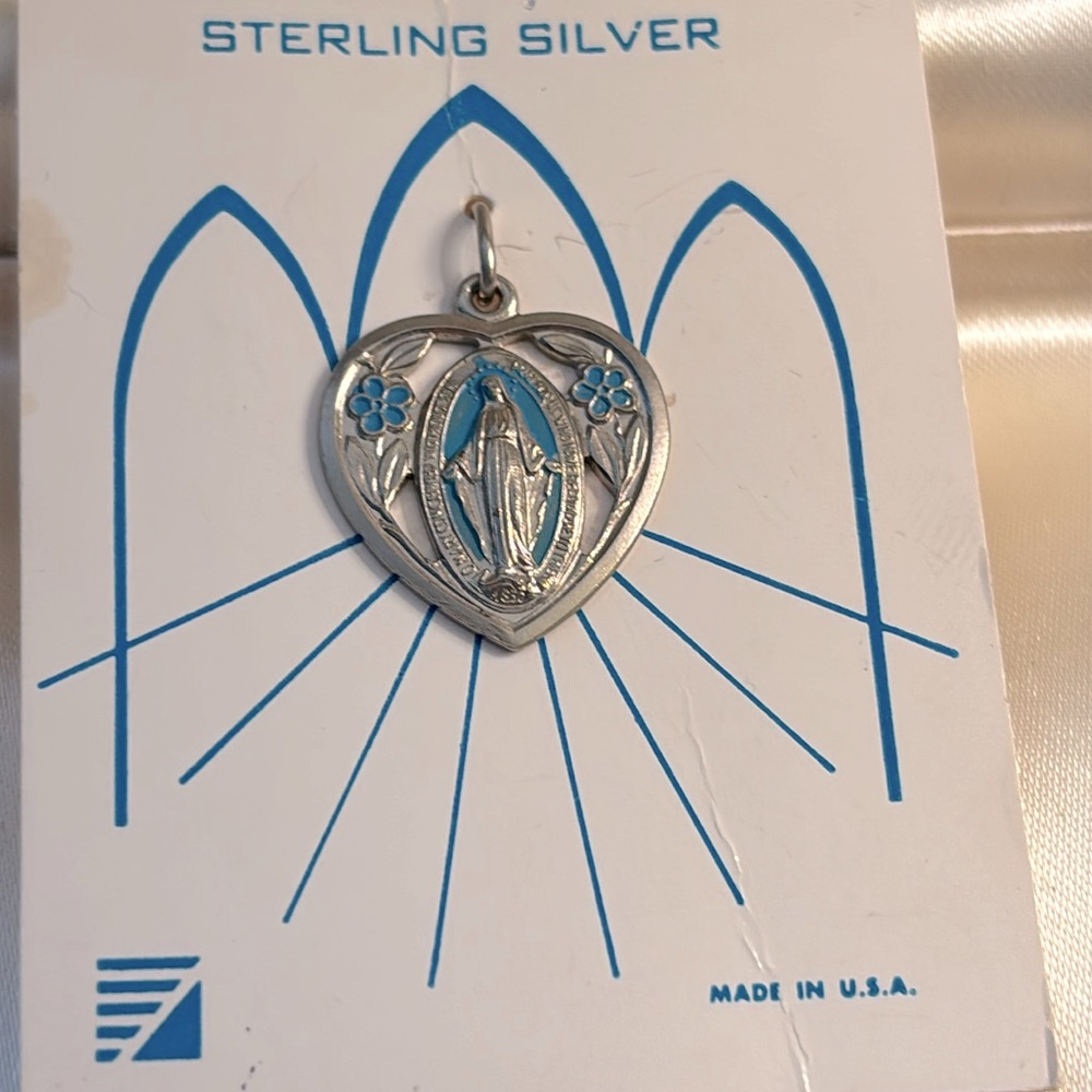 Beautiful sterling silver blessed Mary medal!